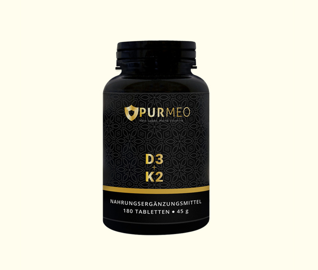 Schwarze Packung mit D3 + K2 Tabletten